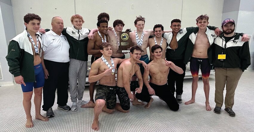 TAKING BACK THE THRONE: The Bishop Hendricken swim team after winning the state title last weekend in Providence. (Photos by Leo van Dijk/rhodyphoto.zenfolio.com)