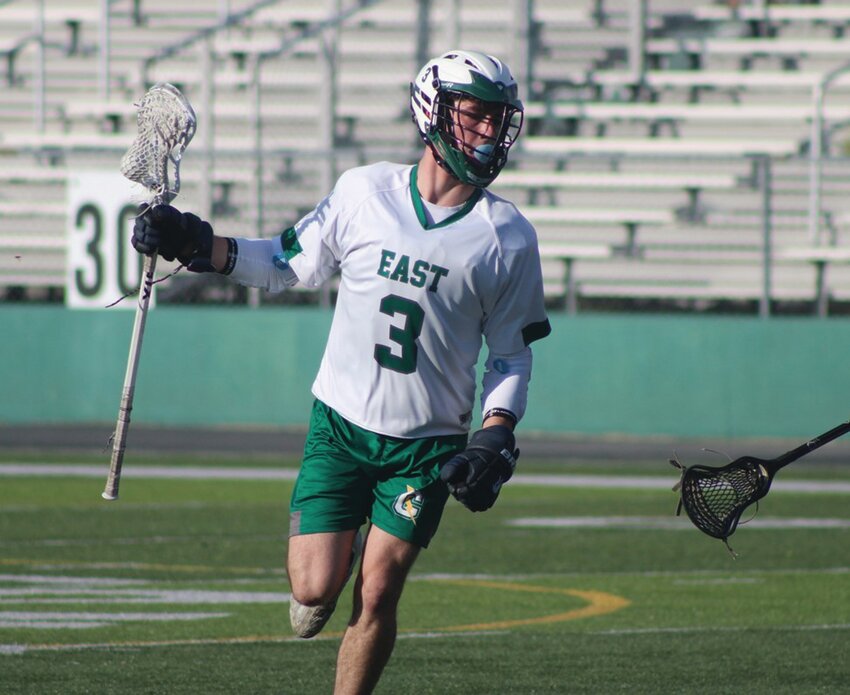 LEARNING THE BASICS: Jacob Spinella cradles the ball on Monday. (Photo by Alex Sponseller)