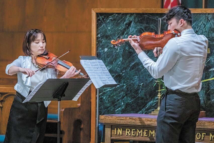 DUET: Pastor Juhee Lee, Joshua Shin from Haven United Methodist Church, East Providence played Fairest Lord Jesus and It is Well with My Soul. (Photos by Mike DiStefano and Noreen Berthiaume)