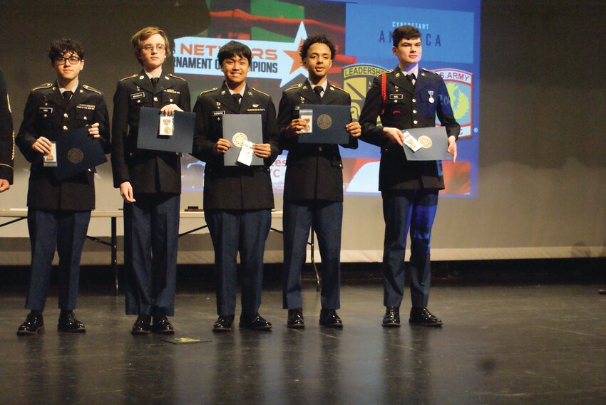 BIG WINNERS: Cyberstart Competitors Award recipients Aiden T. King, Miguel B. Guerrero, Devlin MacIsaac, Sean C. Nisil, Rajhaan Martinez. The team won first in the state and went on to finish seventh at the national competition.   (Cranston Herald photos by Steve Popiel)