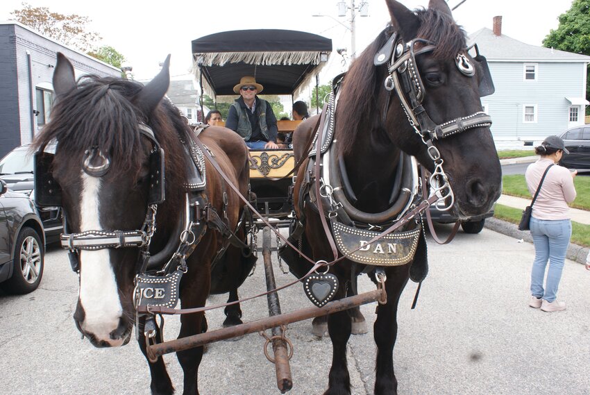 PRINCE &amp; DAN: Horses Prince and Dan, from Liberty Farm, are driven by Chip Tucker, at the Cranston Police Department&rsquo;s Spring Fest held on Rolfe Square on Sunday, May 19. The equine pair gave rides around the neighborhood. For more photos from Spring Fest, go to Page 12. (Cranston Herald photo by Steve Popiel)