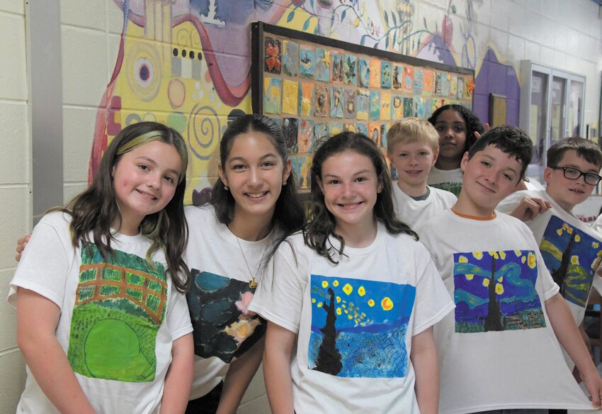 Students line up as they wait to strut their stuff and show off their designs.  (Photos by Barbara Polichetti)