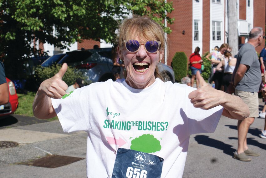 LACING THEM UP: Elly McGuire at the Gaspee Days foot race last week. (Photo by Steve Popiel)