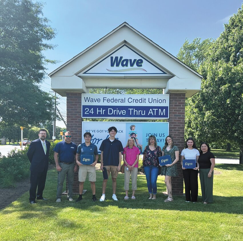 WITH PROUD PARENTS: The scholarship recipients are joined by Wave&rsquo;s President/CEO David P. Dup&eacute;r&eacute; and their parents. From left are: David P. Dup&eacute;r&eacute;,  Bryan Barlow and Ryan Barlow, Tyler Lattanzio and Allison Lattanzio, Nicole Moffat and Samantha Moffat, Sofina McAllister and Jimema McAllister. (Submitted photo)