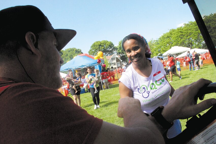 CHECKING IN WITH VOLUNTEERS:  Pastor Matthew McIntosh of Warwick Hope Assembly of God and coordinator of Warwick Hope Day made the rounds of the event held from 1 to 4 p.m. in a golf cart. As of 2:30 p.m. more than 700 people visited the fifth annual Hope Day. (Warwick Beacon photos)