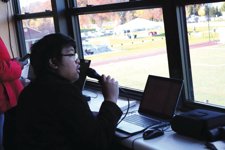 ANNOUNCING BIG GAMES: Yean made the public address announcements for the 2023 RIIL Girls' Soccer Divisional Championships.