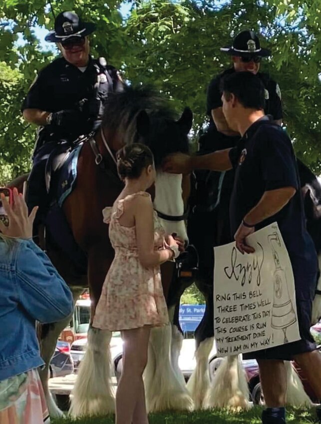 GET THE PARTY STARTED: Cranston Police threw a big celebration for Izzy Major following her last day of leukemia treatment. (Photo courtesy Cranston Police)