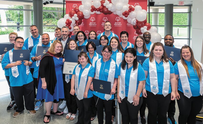 SMILING GRADUATES: The first class of Special Olympians that graduated from the Athlete Leadership University gather for a class picture. (Submitted photo)