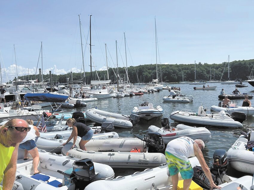 A FULL COVE: Participants in the dinghy rally to raise funds for the Tomorrow Fund added to the boating crowd on Greenwich Bay Sunday. (Submitted photo)