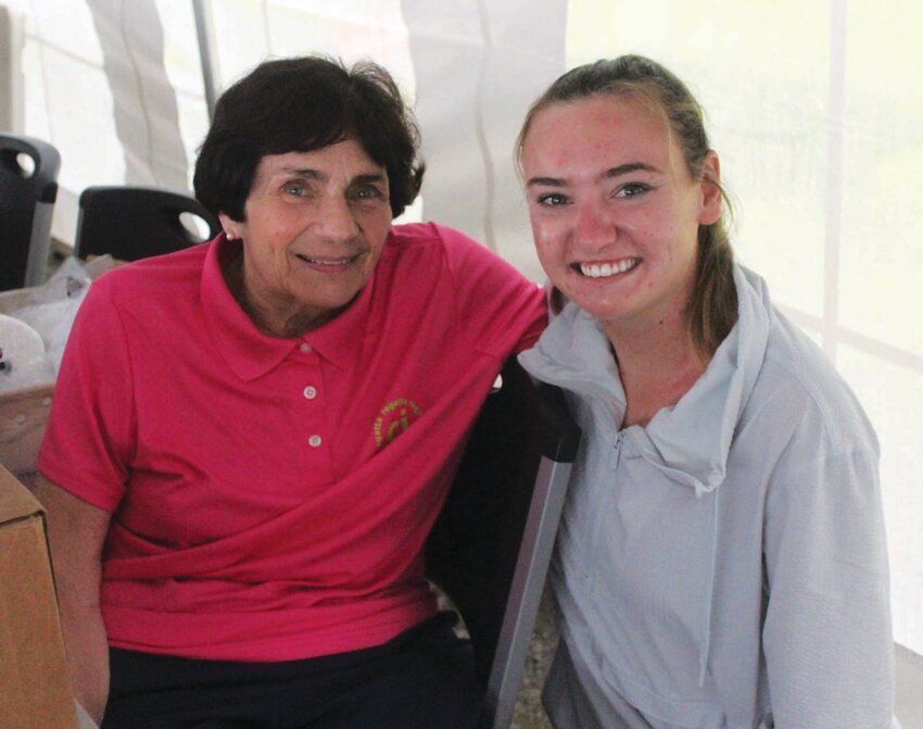 ANOTHER YEAR   TOGETHER: Lucy Buckley and volunteer Katie Coughlin spend some time catching up prior to the event