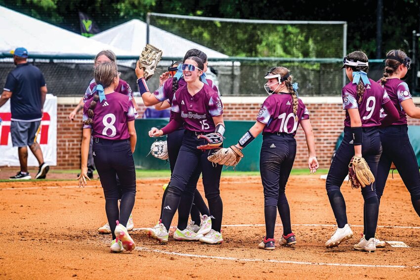 READY TO REPEAT: Members of the CLCF-CWLL softball team celebrate. (Photo courtesy Little League Baseball &amp; Softball)