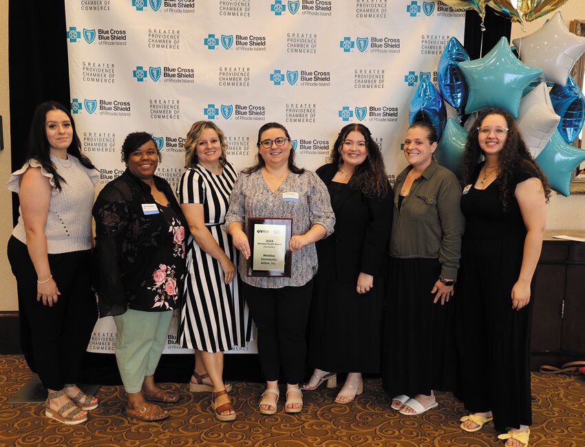 WORKING WELL: Westbay Community Action employees pictured from left Kahree Paolantonio, Helen Washington, Julie Dixon, Tori Ganimian, Delta McKay, Heather Dias and Kyla Groves celebrate receiving a Worksite Health Award.