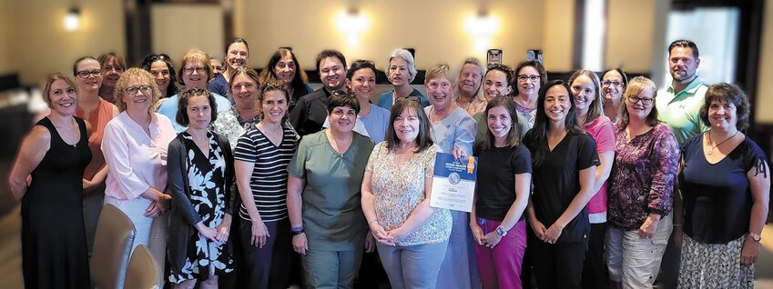 SUPERIOR PERFORMERS: The Saint Elizabeth Home Care community gather for a photo. (Submitted photo)