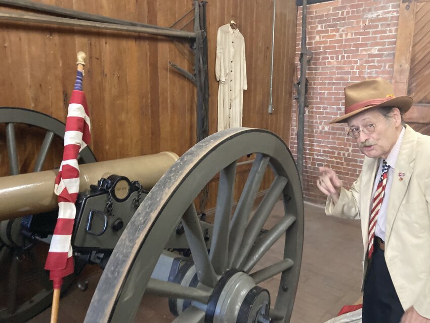 JOB WELL DONE: Maj. Gen. Reginald Centracchio presents Cranston Historical Society’s Gregg Mierka with his challenge coin, honoring him for his work in procuring and protecting the cannons. (Cranston Herald photos by Adam Zangari)