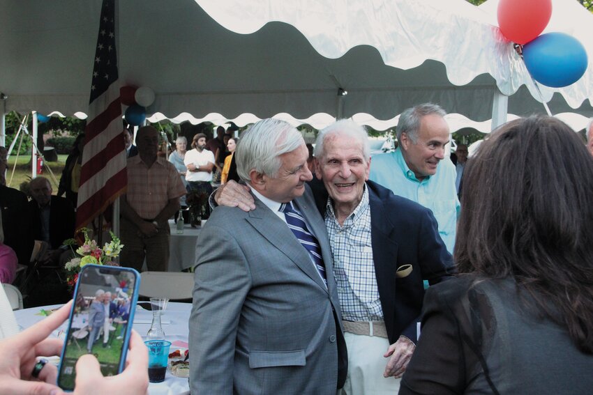 A GENERAL AT 109 YEARS YOUNG: Cranston resident Henry Polichetti, the second oldest World War II veteran in the country, was made an honorary Brigadier General in the R.I. National Guard by retired Lt. Gen. Reginald A. Centracchio in Cranston Historical Society ceremonies Friday. Here, Sen. Jack Reed, who was also honored, bestows the award.  (Cranston Herald photos by Barbara Polichetti)