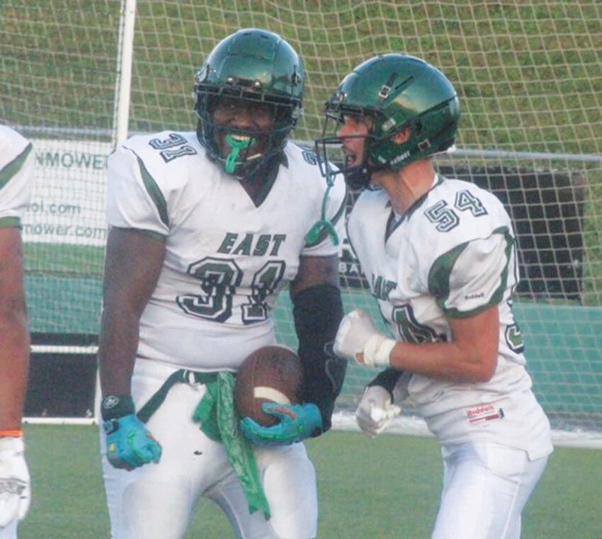 READY TO ROLL: East&rsquo;s Saqari Monroe (31) and Logan Enos (54) last week. (Photos by Alex Sponseller)