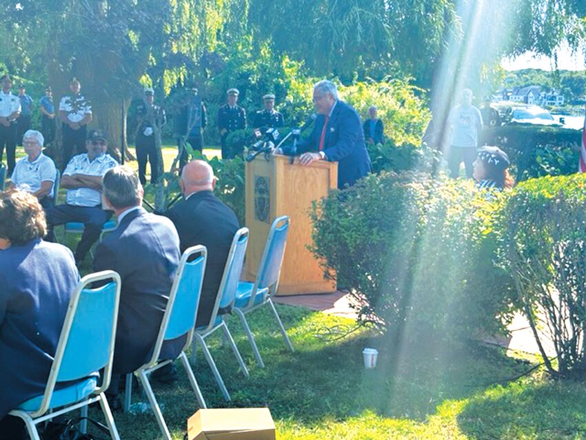 UNSUNG HEROES: Gene Valicenti of NBC 10 speaks at the 9/11 Memorial Garden at Oakland Beach about his experience at Ground Zero. (Warwick Beacon photos)