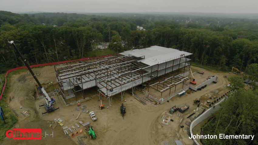 PROJECT FROM THE AIR: Justin Bernard, Senior Project Manager of Colliers Project Leaders, provided these photos, taken from a drone on Aug. 16. He shared a slide show with the Johnston School Building Committee.