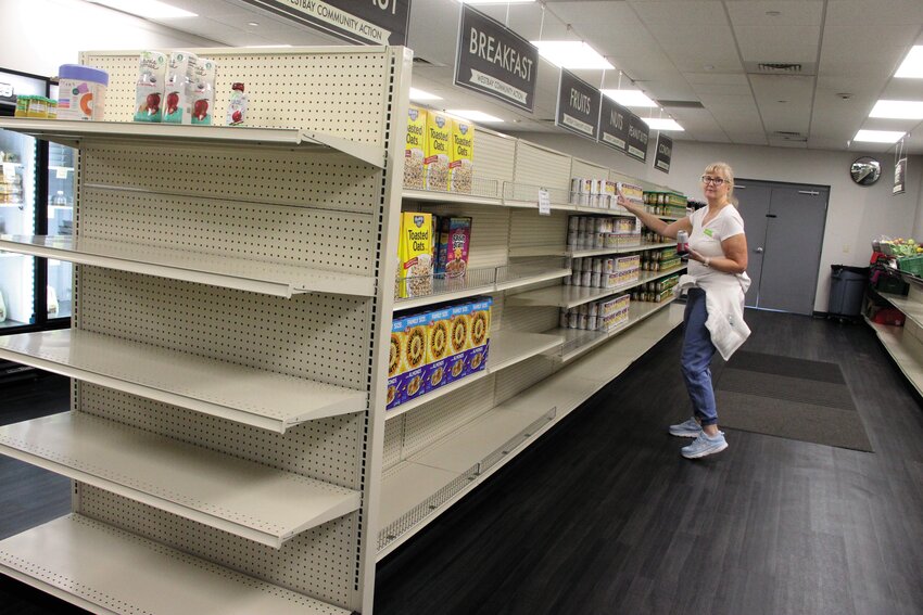 NOT QUITE CLEANED OUT: Many shelves at the Westbay Marketplace were cleaned out by Friday. With deliveries coming in this week, Westbay Community Action President Paul Salera expects they&rsquo;ll be restocked. More than 500 people &ldquo;shop&rdquo; at the market weekly, which Salera said is a slight increase over last year&rsquo;s numbers at this time. (Cranston Herald photo)