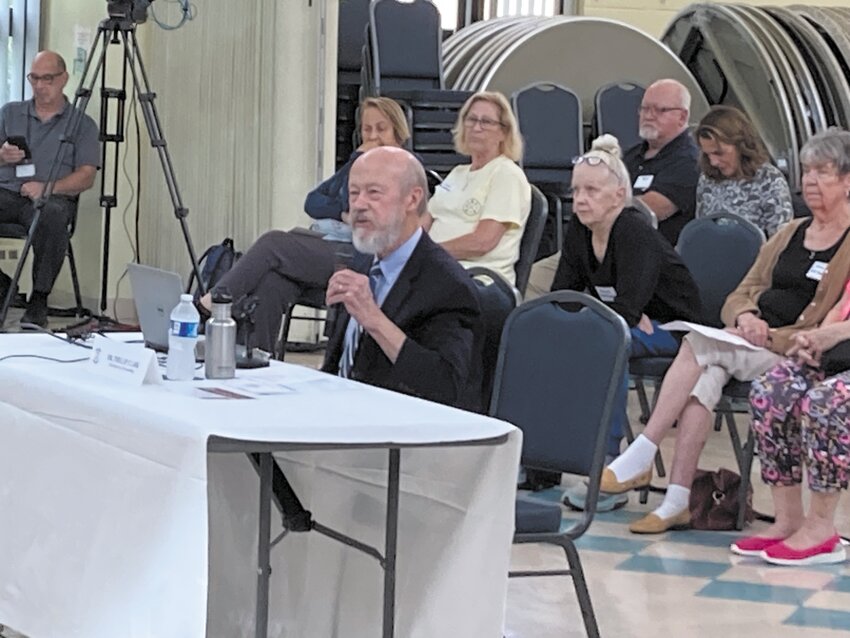 TALKING ABOUT AGING: URI Gerontology Program Director Phillip Clark speaks before the committee on the positive and negative cultural views on aging, and how to make those views more positive. (Warwick Beacon photo)