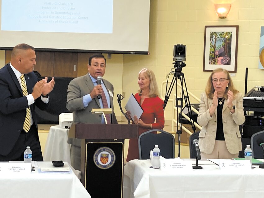 HONOR RECEIVED: Speaker of the House Joe Shekarchi awards Pilgrim Senior Center Director of Senior Services Meg Underwood a citation for her work. (Warwick Beacon photo)