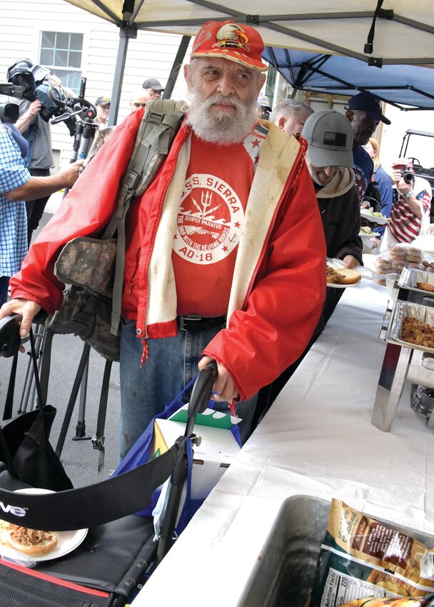 THE WAY TO A VETERAN'S HEART: A hearty hot lunch helped warm up the damp day. (SunRise photos by Barbara Polichetti)