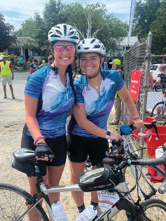 RIDING TOGETHER: Caroline Taylor and Claire Fracassa take part in the Pan-Mass Challenge. (Submitted photo)