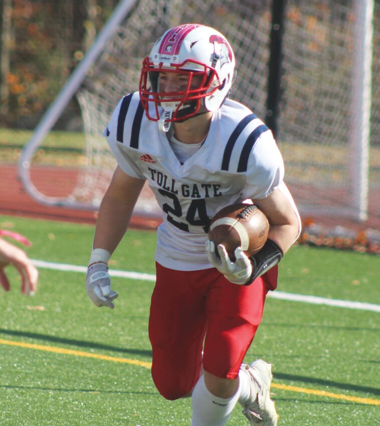 Shane Moro picks up some yards. (Photos by Alex Sponseller)