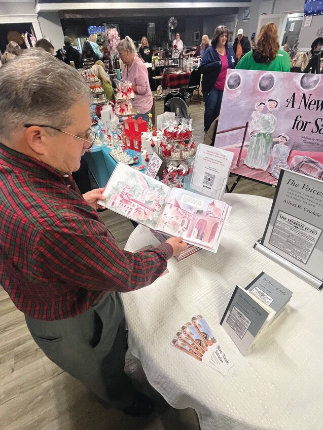 Al Crudale formerly of Cranston, shows his latest work at the craft show at the St. Mary&rsquo;s Feast Society. (Beacon Media photo)