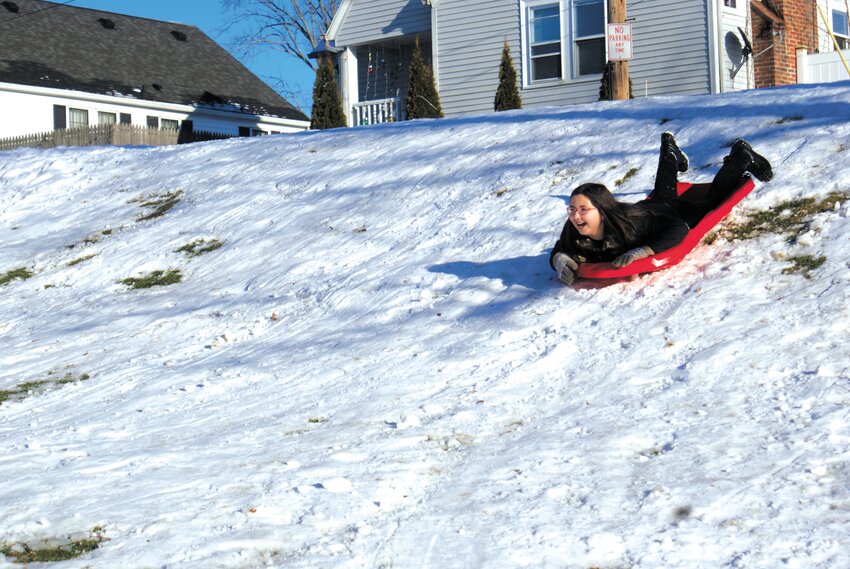 First snow (Jan. 8): Kids took advantage of the first snow of the season, which brought perfect sledding conditions! (Beacon Media photos by Pam Schiff and Steve Popiel)