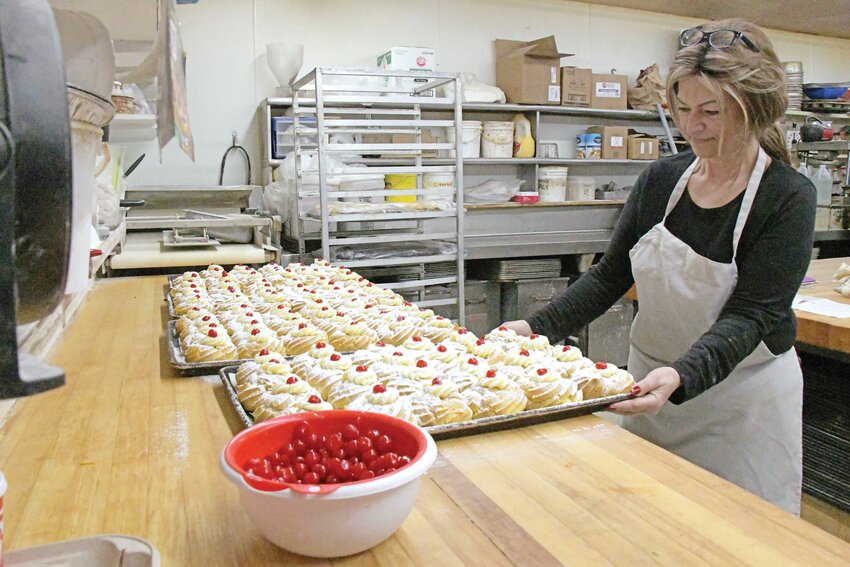 Gini Nani at DeLuise Bakery with what seems like an endless supply of zeppole.
