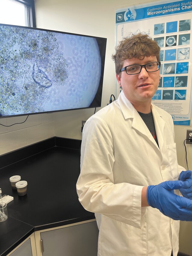 Kyle Dorsey, a pre-treatment inspector and lab technician for the Warwick Sewer Authority, spoke about all the living organisms, including the Rotifer pictured here, that play a vital role in keeping the wastewater treatment plant running.  Beacon Media photo by Joy Fox