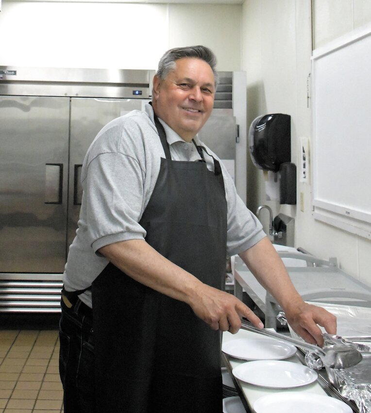 Senior Center Director Richard Delfino Jr. said he was happy to get up early Friday to make breakfast for his staff at the Senior Center.