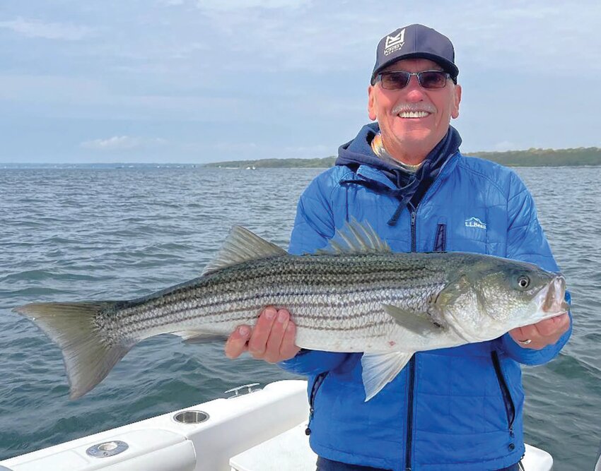 Flutter spoon catch: Jim Lundy caught this East Passage striped bass using a flutter spoon last week. Submitted photo
