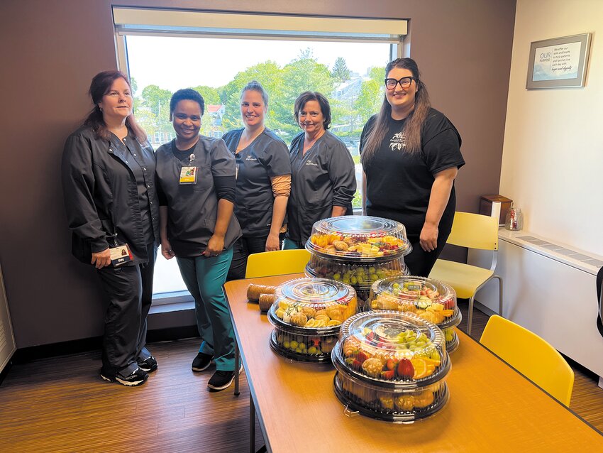 From left are HopeHealth Hulitar Hospice Center Manager Christine Daniels, RN; Inpatient Unit Hospice Aide Domingas Vaz, CNA; Inpatient Unit Nurses Monique Boulanger, RN and Roxanne Currier, RN; and Charcuterie Kreations founder and owner Kara Meneses.