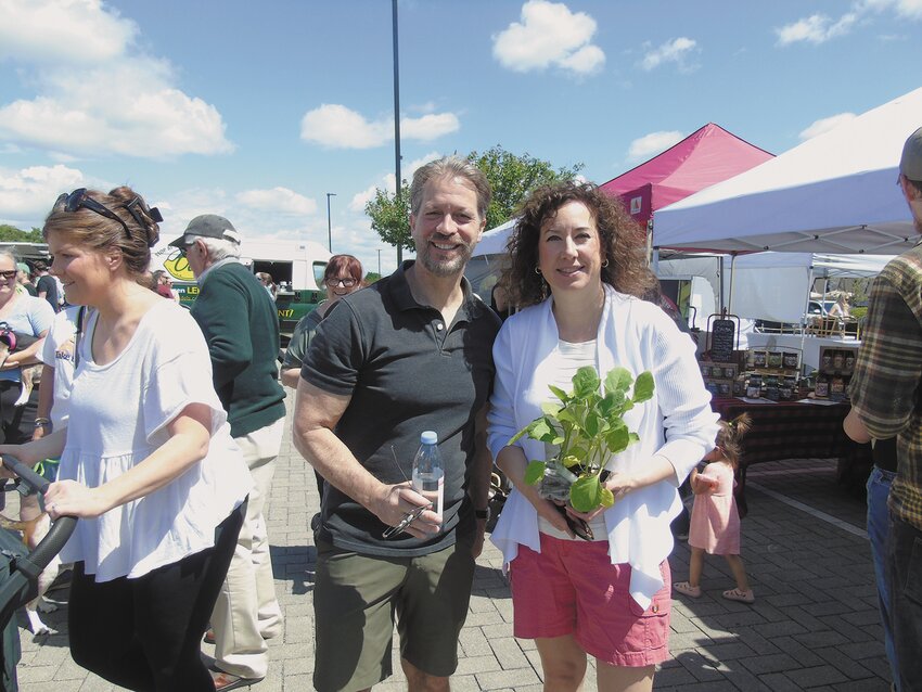 Marino runs into a colleague, City Council Vice President Daniel Wall, at the market.