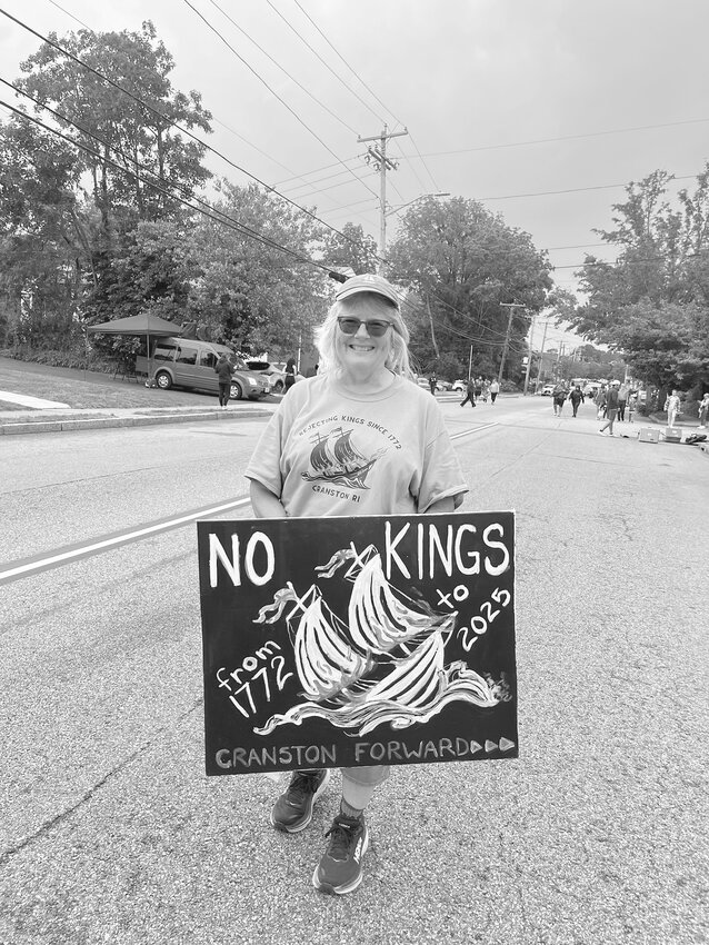 Gaspee Parade spectator on Broad Street at the start of the 5k.