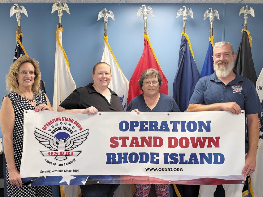 Brenda Reid of Pawtucket, Melanie Loesch of Glocester, Sharon Gentry of Glocester & OSDRI Staff Member George Luttge (Left to Right) joined Operation Stand Down Rhode Island’s Executive Director Erik B. Wallin to present to OSDRI a donation of $60,816.75.