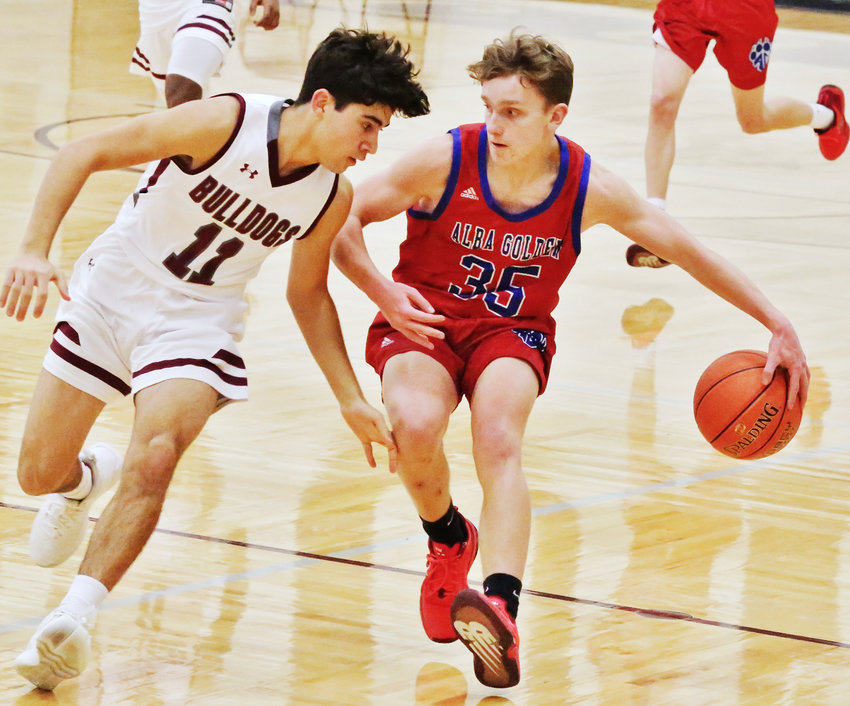 Panther Gavin Parker protects the ball during a close game last Tuesday at Cooper.