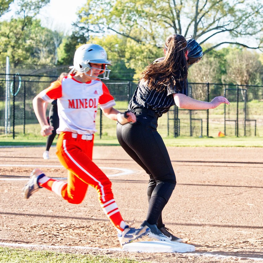 Kenleigh Aguirre gets an infield hit against Winona in district softball action. [see more hits]