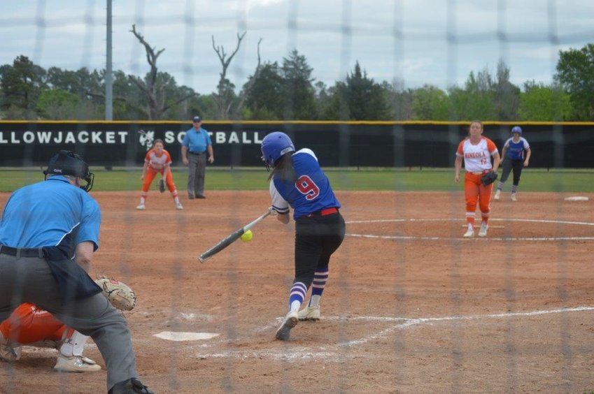 Quitman Lady Bulldog Alexis O&rsquo;Neals hits a single to left field in Friday&rsquo;s 13-0 win at Mineola.