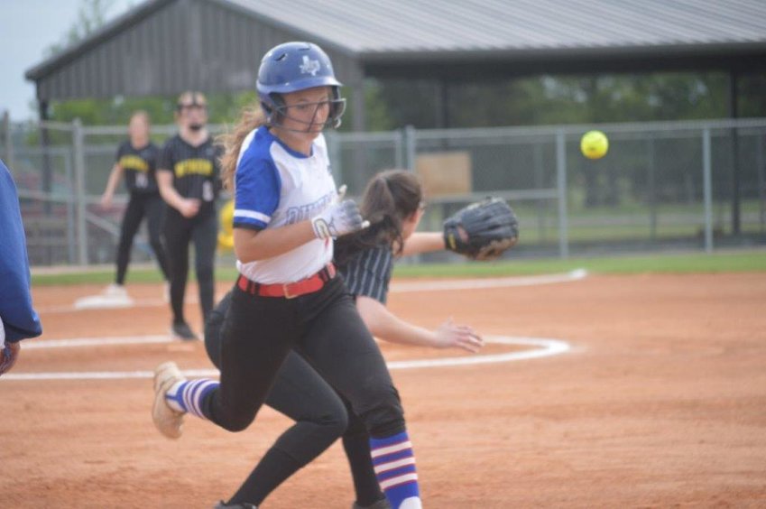 Quitman&rsquo;s Larkin Spears beats the throw to first base. The talented freshman had two hits in the Lady Bulldog&rsquo;s 15-0 win over Winona.