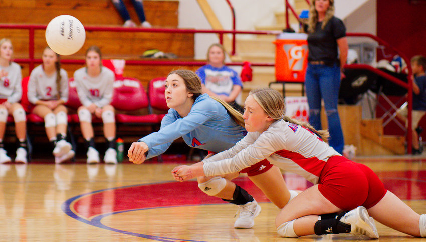 Kamrin Wright and Alyssa Murdock dig out a shot for the Lady Panthers in last week&rsquo;s victory over PTAA Fate.