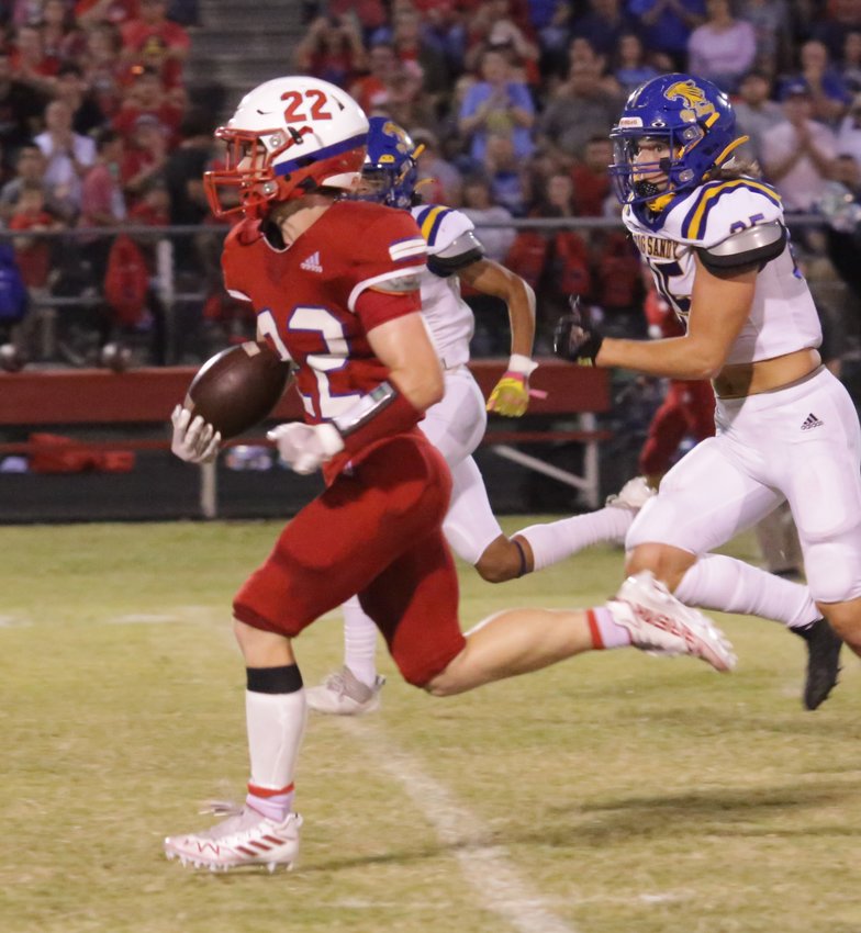Panther Glen Hartley splits the Wildcat secondary on his 66-yard touchdown run.