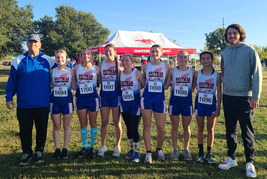 Quitman girls&rsquo; cross country team placed fifth in the Class 3A state meet Saturday. They are, from left, Head Coach Michael Scott, Amarita Bautista, McKenna Wood, Maddy Pence, Kendall Davis, Bonnie Vanderschaaf, Braleigh Wood, Katie De Gorostiza and Assistant Coach Laettner Greenhill.