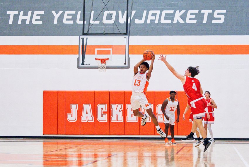 Ainsley Steward leaps into the passing lane to secure one of his three steals of the game, quickly turning this one into two points.