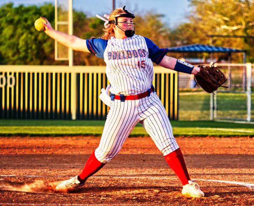Kennedi Elmore throws a pitch in the middle innings of her complete game.