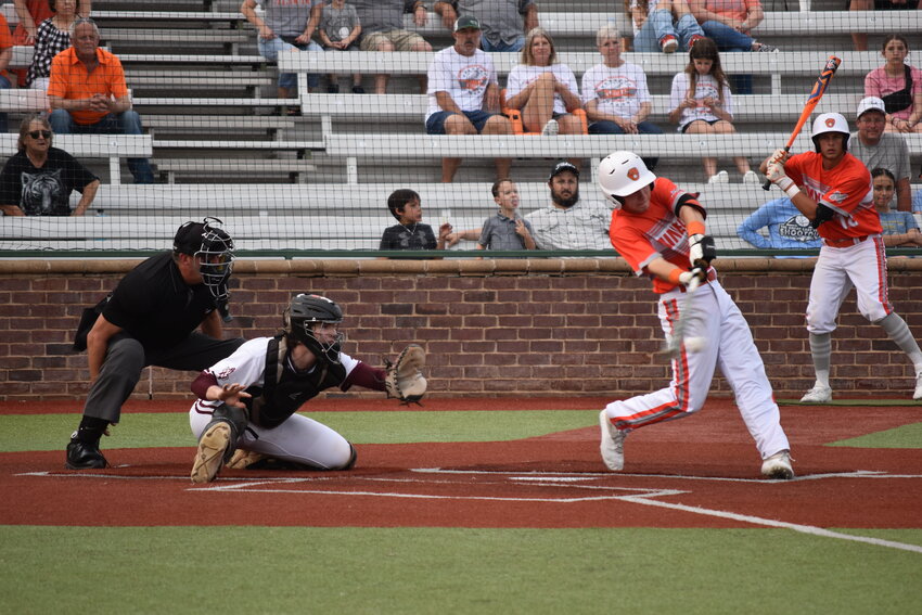 Cason Davis connects for a two-strike hit to open Thursday&rsquo;s playoff game against White Oak.