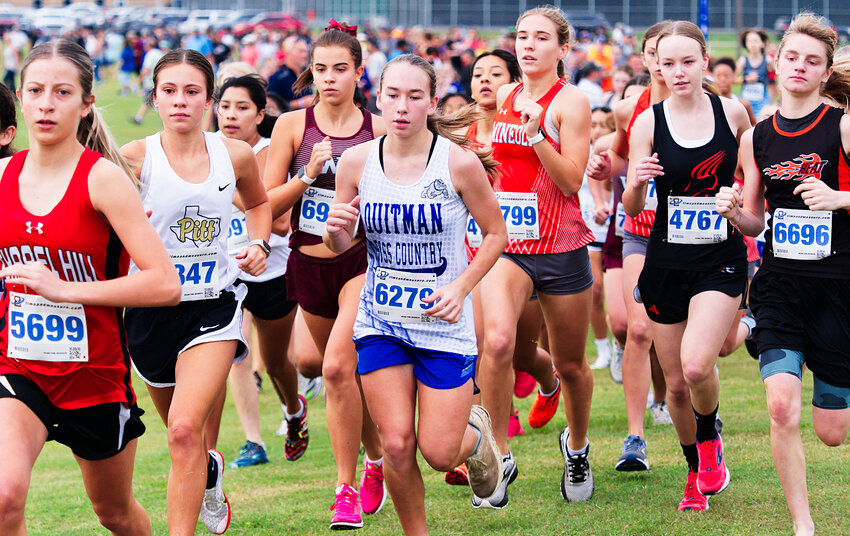 Braleigh Wood (center) of Quitman, trailed closely by Raylie Peebles of Mineola, get off to a quick start, eventually finishing first and sixth, respectively.