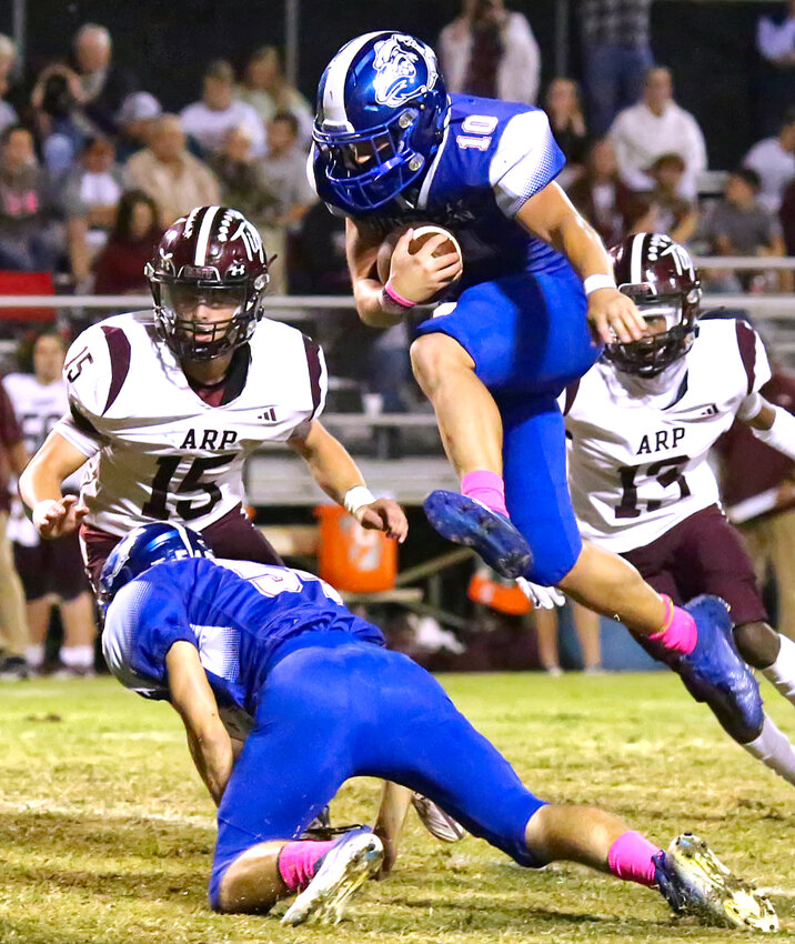 Mikey Pickering elevates on a carry off of left tackle.